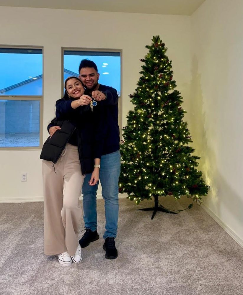Andres and Paola A. at their new home